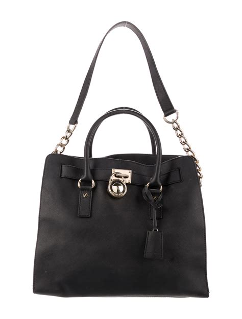 michael kors unhängerienen für|Michael Kors leather tote.